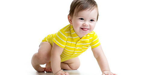 baby learning to crawl